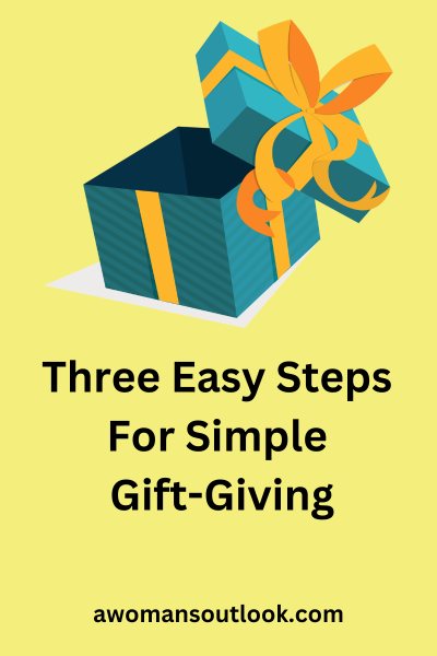 Blog graphic for blog post. Words Three easy steps for simple gift-giving at below a blue box with a gold bow on a light yellow background. awomansoutlook.com